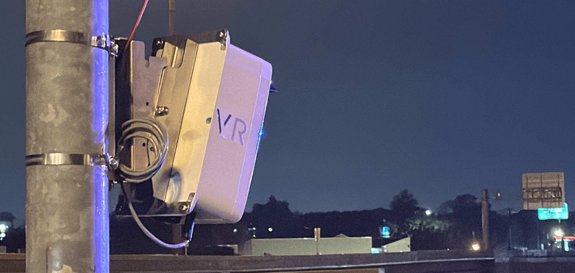 Installed device with bracket